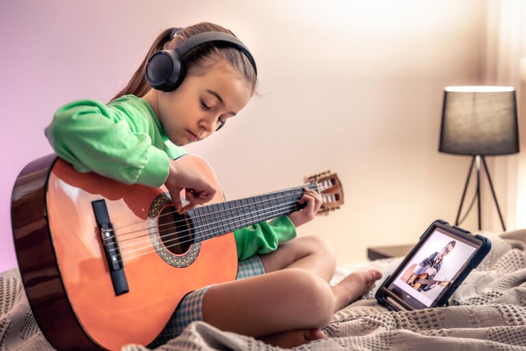 Girl-playing-Guitar